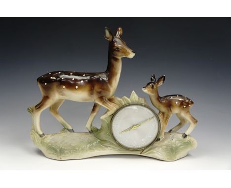 A 1960s Jemma of Holland kitsch ceramic mantel clock modelled a deer and faun, (a/f), 40 cm long