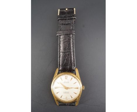 A 1950s Accurist Shockmaster waterproof antimagnetic wristwatch, having a 21 jewel manual wind movement and gold plated case,