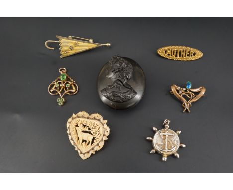 A group of Victorian and later jewellery including a Belle Epoque openwork pendant and a similar Art Nouveau brooch