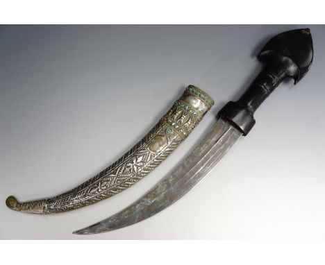 A Middle Eastern khanjar / dagger gifted by Saddam Hussein, having a horn handle and white metal covered wooden scabbard, 42 