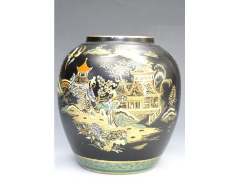 Carlton Ware vase of compressed ovoid form, with gilt japonisme decoration highlighted with enamels on a satin black ground, 