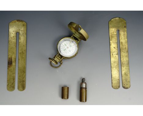 A Great War 4th Northumberland Fusiliers buttons stick, one other clothing protector, a 1940s Utility Lighter and an Engineer