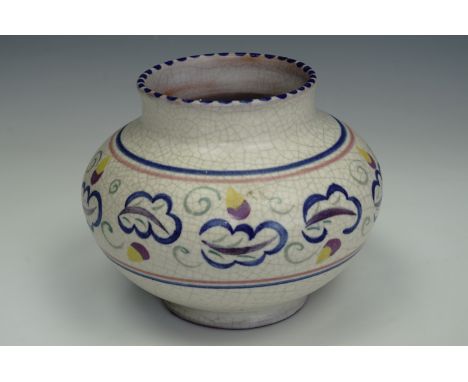 A Carter, Stabler, Adams Poole pottery vase, of oblate form, hand decorated with a band of stylized acorns and oak leaves, de