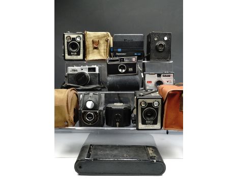 A Instamatic 100 camera together with a quantity of other vintage cameras 