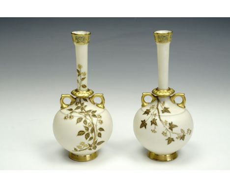 A pair of Royal Worcester blush ivory bottle vases,  with slender neck and two handles to base, floral decoration with raised