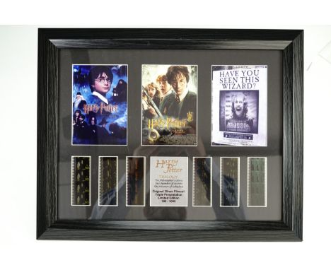 Two Harry Potter framed film stills together with a framed Lord Of The Rings film stills