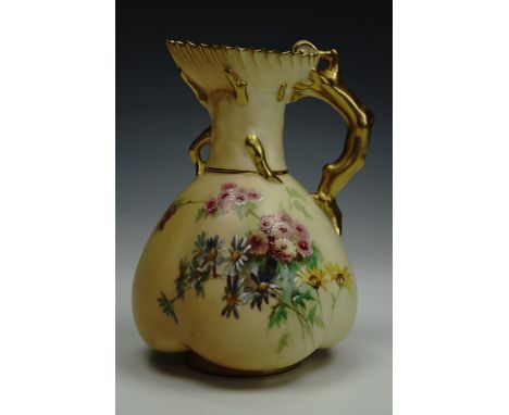 Royal Worcester blush ivory jug with a round body with a lobed base, corral-form handle and shell form spout, overglaze ename