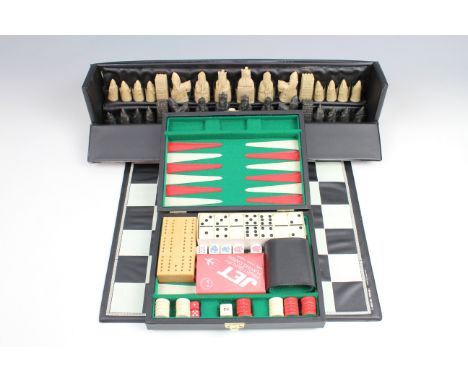 A Lewis chess set, Kings 63 mm, resin, circa 1970s, together with a travel backgammon set