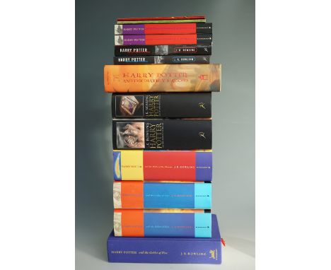 J K Rowling, 11 Harry Potter books and two booklets, including three paperbacks and some first editions.