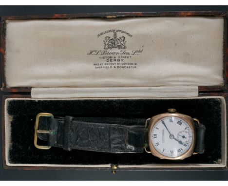 A 1930s 9 ct gold wristwatch, having a Swiss movement and circular white enamel face with Roman numerals, blued steel hands a