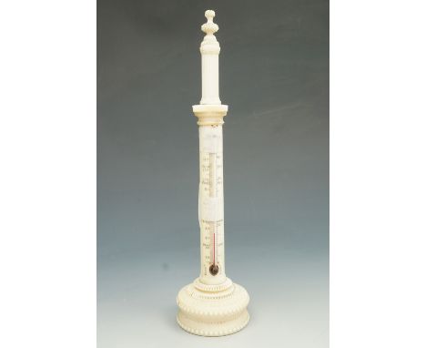 A 19th Century turned and carved ivory desk thermometer, of columnar form, having Fahrenheit and Roemer scales, 24 cm