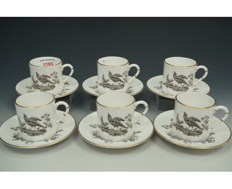 A set of six Royal Worcester coffee cans with saucers