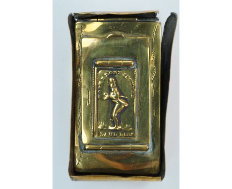 A Victorian two-compartment brass snuff box, the lid embossed in depiction of a gentleman with top hat and cane, and the lege