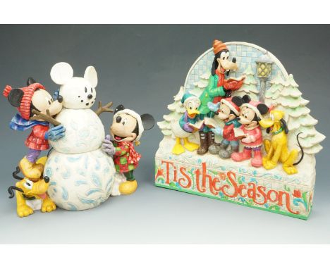 Two boxed Enesco 'Walt Disney Collection' pieces, 'Magic Comes in Many Shapes' and 'T'is the Season' plaque.