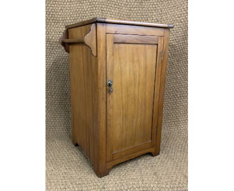 An early 20th Century walnut wash stand, having an enamelled basin, 50 cm x 43 cm x 78 cm