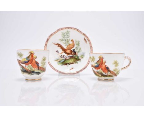 A Coalport trio of coffee cup, teacup and saucer, circa 1860, with divided entwined handles, painted by John Randall in his l