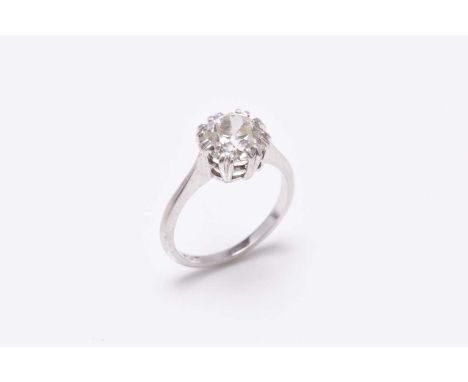 A single stone diamond ring, the cushion cut diamond claw set in white metal to white metal shank, stamped 'plat', ring size 