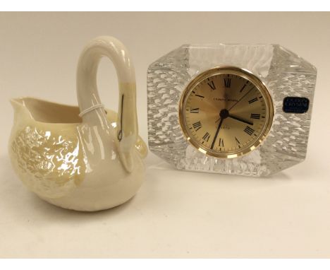 A Belleek swan, brown mark to base, together with a Dublin crystal clock (2)
