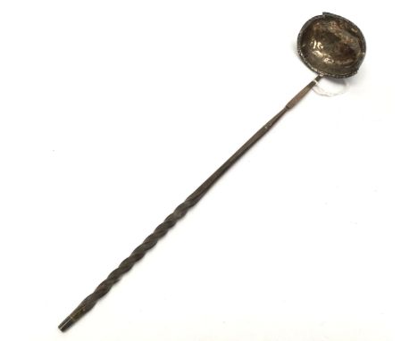 A George III silver ladle, stamped I.M, possibly for John Munns, having a Wrythern turned horn handle, slightly af 