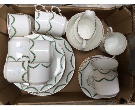  Aynsley china, Edwardian tea service with green foliage swags with red ribbon, almost a Christmas design, twelve, cups, sauc