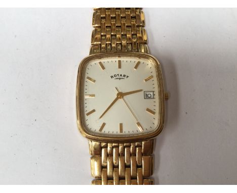 A Rotary gold plated ladies wristwatch, with a white dial, chain strap, complete with guarantee card and box