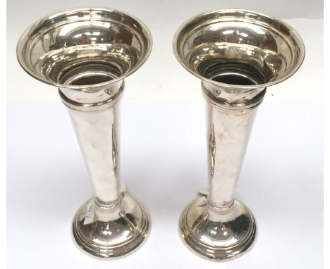 A pair of George V silver trumpet vase, London 1916, weighted 