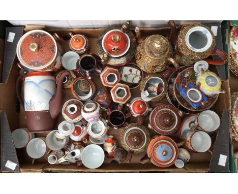 A collection of Japanese eggshell tea ware; pots, cups and saucers, biscuit barrel; sucriers; biscuit barrel; miniature vases
