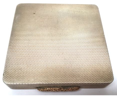 Alfred Dunhill silver compacts, engine turned with 9ct gold thumb piece, Birmingham 1944/45 