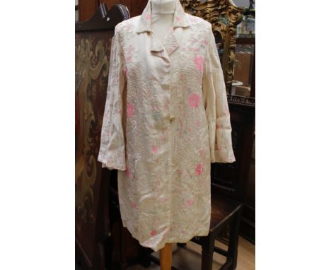 A fully lined satin item, a satin embroidered dressing gown given to the vendors mother during World War Two by a soldier ser