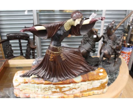 An Art Deco style lamp figure of a lady on marble base. Size 61cm wide by 52cm in height.