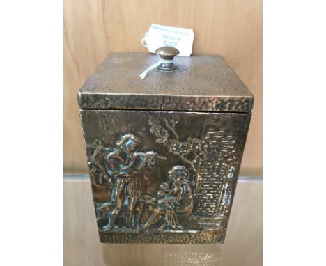 A brass tea caddy
