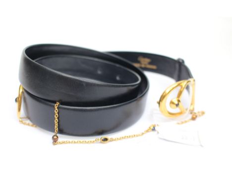 CARTIER dark blue leather belt,  gold tone buckle fastening with  sapphire cabochon and pearl set chain detail, length approx