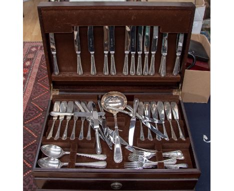 A comprehensive boxed set of silver plated cutlery for twelve, to include 12 table and 12 side plates, steel bladed  and silv