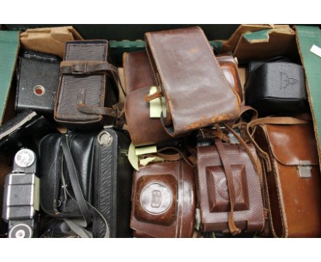 A box of vintage folding cameras, including early Eastman Kodak No. 1A, Agifold, Pentacon, mostly in leather cases