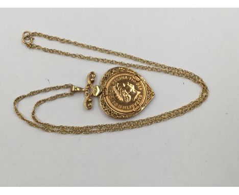 A 2001 half Sovereign in 9ct mount with diamonds and a 9ct chain, 10.6 grams gross approx 