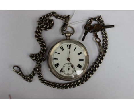 An Edwardian silver gents pocket watch, Chester 1901, the black engine turned and having a central cartouche, numbered to ins