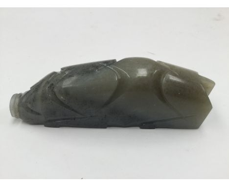 A late Ming design jade recumbent pig, 20th Century, width 11cmCondition: good overall 