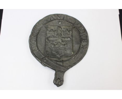 A cast lead Notts and Derby wall plaque 