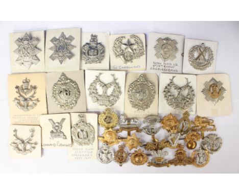 A collection of over thirty restrike WW2 and Post War British Army cap badges to include: The Dorsets, The Kings Own, The Roy