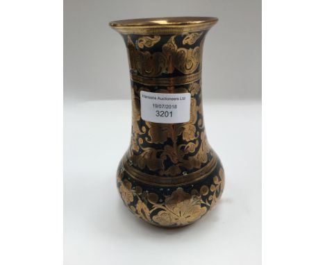 An Indian niello technique brass vase, possibly Binares (India), engraved and part coloured with floral motifs, height 16cm
