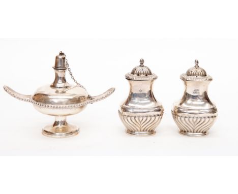 A silver 'Aladins lamp' and cover, London 1929, silver salt and pepper, Birmingham 1910, total weight approx 6.38 ozt (three 