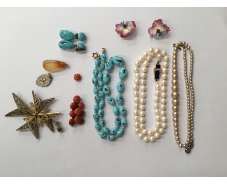 A small collection of costume jewellery to include turquoise coloured beads, Royal Crown Derby earrings (boxed) a gilt metal 