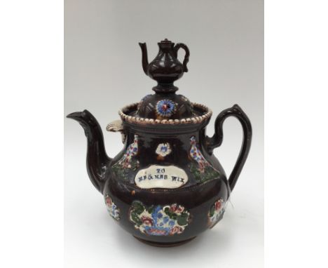 A Barge ware teapot to Mr and Mrs Wix 