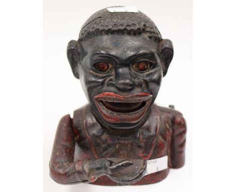 Vintage 'Jolly Nigger Bank', money bank cast, with good patina
