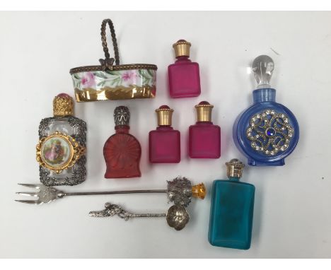 A small silver pickle fork with thistle finial; together with a perfume bottle with enamelled picture to front, three further
