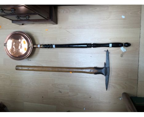 A late 19th Century/early 20th Century ice axe, with a copper warming pan (2) 