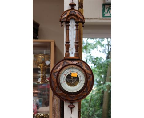 An Edwardian beech cased banjo barometer and thermometer