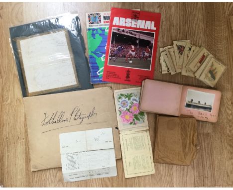 An Arsenal autographed sheet, late 40s, early 50s and an autograph book, programmes and Kensitas cigarette cards etc