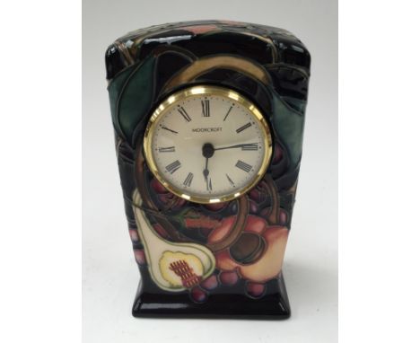 A Moorcroft mantle clock, Anna Lily pattern, 1st quality 