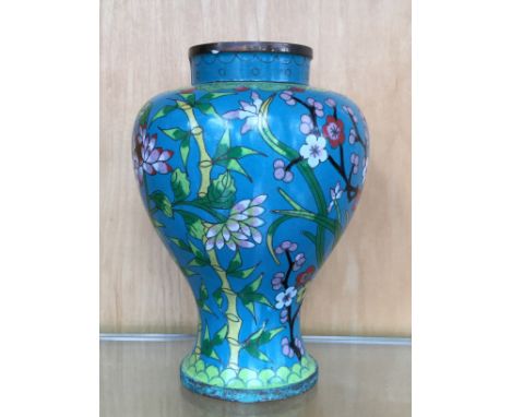 A Chinese cloisonne vase, chrysanthemum and prunus flowers on turquoise ground 